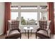 Cozy sitting area with large windows and comfortable chairs at 228 Emerald Ct, Castle Rock, CO 80104