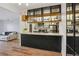 Kitchen with granite countertops, sleek appliances, and stylish shelving at 579 Wright St # 204, Lakewood, CO 80228