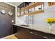 Modern kitchen design featuring granite countertops and an open shelving unit at 579 Wright St # 204, Lakewood, CO 80228