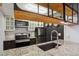 Modern kitchen with granite countertops, and stainless steel appliances at 579 Wright St # 204, Lakewood, CO 80228