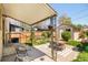 Private backyard with patio, shed, mature landscaping, and an outdoor dining area at 3110 N Franklin St, Denver, CO 80205