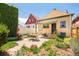 Charming backyard with patio, dining set, and garden at 3110 N Franklin St, Denver, CO 80205