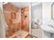 Bathroom featuring a glass enclosed shower and stand alone sink at 3110 N Franklin St, Denver, CO 80205