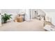 Spacious bedroom featuring neutral carpet, a writing desk and a comfortable reading chair at 3110 N Franklin St, Denver, CO 80205