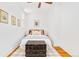 Charming bedroom with decorative pillows, a vintage trunk, and hardwood floors at 3110 N Franklin St, Denver, CO 80205