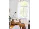 Cozy living room with a large window and neutral-toned decor at 3110 N Franklin St, Denver, CO 80205