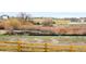 Scenic view featuring a natural landscape and distant neighborhood homes, showcasing the area's serene environment at 917 W Beverly St, Elizabeth, CO 80107