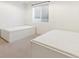 Cozy bedroom with two beds, perfect for or guests, offering comfortable living space at 21 Birdie Ln, Littleton, CO 80123