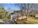 Charming home with a spacious driveway, attached garage, and well-kept front yard at 21 Birdie Ln, Littleton, CO 80123