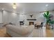 Cozy living room with a fireplace, comfortable seating, and stylish decor at 21 Birdie Ln, Littleton, CO 80123