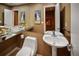 Cozy bathroom with white fixtures, modern tile and decor at 250 S Dahlia St, Denver, CO 80246