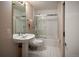 The bathroom features a toilet, sink, and shower-over-tub, offering a functional and pleasant space at 250 S Dahlia St, Denver, CO 80246
