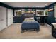 A spacious bedroom with a desk, carpet, and ample natural light at 250 S Dahlia St, Denver, CO 80246