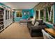 Bright bedroom featuring dual windows, a couch and ample storage space at 250 S Dahlia St, Denver, CO 80246