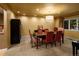 Traditional dining room with carpet, wood table and furniture, and modern lighting at 250 S Dahlia St, Denver, CO 80246