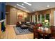 Inviting living room with a large sectional sofa, skylights, and a warm color palette at 250 S Dahlia St, Denver, CO 80246