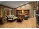 Bright living room boasts hardwood floors, built-in shelving, and comfortable seating at 250 S Dahlia St, Denver, CO 80246