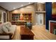 Cozy living room with custom built-ins, hardwood floors, and plenty of natural light at 250 S Dahlia St, Denver, CO 80246