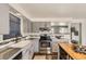 Well-appointed kitchen with granite countertops, a stainless steel oven, and modern appliances at 8258 Cherokee St, Denver, CO 80221