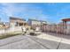 Private backyard with stone fire pit, chairs and table, offering a relaxing outdoor space at 1066 S Eaton Park Ct, Aurora, CO 80018
