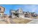 Beautiful two-story home featuring a two-car garage, manicured lawn, and inviting curb appeal at 1066 S Eaton Park Ct, Aurora, CO 80018