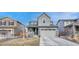 Charming two-story home with a two-car garage, stone accents, and a well-maintained front yard at 1066 S Eaton Park Ct, Aurora, CO 80018