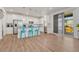 Well-designed kitchen with ample cabinet space and stainless steel appliances seamlessly connects to living spaces at 1066 S Eaton Park Ct, Aurora, CO 80018