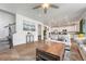 Spacious and inviting living room with hardwood floors and an open layout to the kitchen at 1066 S Eaton Park Ct, Aurora, CO 80018