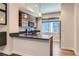 Well-equipped kitchen with modern cabinetry, stainless steel appliances, and granite countertops at 5530 W 11Th Pl, Lakewood, CO 80214