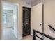 Conveniently located laundry room with stacked washer and dryer for efficient space saving at 5530 W 11Th Pl, Lakewood, CO 80214