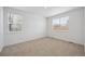 Bright and airy bedroom with wall to wall carpeting and dual windows at 6501 14Th St, Frederick, CO 80530