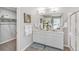 Double vanity bathroom with a shower and walk-in closet at 3274 Belleville Ridge Rd, Elizabeth, CO 80107