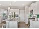 Modern kitchen with stainless steel appliances and an island at 3274 Belleville Ridge Rd, Elizabeth, CO 80107