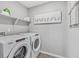 Convenient laundry room with Whirlpool washer and dryer at 3274 Belleville Ridge Rd, Elizabeth, CO 80107