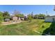 Spacious backyard with storage sheds and mature trees at 6303 W Exposition Ave, Lakewood, CO 80226