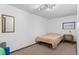 Unfurnished basement space featuring carpet, minimal natural light, and versatile potential for future customization at 6303 W Exposition Ave, Lakewood, CO 80226