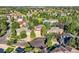 Aerial view featuring a cul-de-sac homes, mature trees, and community pool at 13891 Muirfield Ct, Broomfield, CO 80023