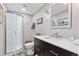 Modern bathroom with shower, vanity, and decoratively tiled floors at 7500 E Dartmouth Ave # 8, Denver, CO 80231