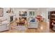 Inviting living room with hardwood floors, fireplace, and comfortable seating at 7500 E Dartmouth Ave # 8, Denver, CO 80231