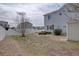 Fenced backyard area with mature tree and shed at 18997 E 51St Pl, Denver, CO 80249