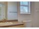 Bright bathroom with a large mirror and vanity at 18997 E 51St Pl, Denver, CO 80249