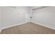 This basement features carpet and neutral paint at 8199 Welby Rd # 501A, Denver, CO 80229