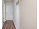 Hallway features a hard surface floor and coat hooks at 8199 Welby Rd # 501A, Denver, CO 80229