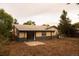 Backyard featuring an attached patio and spacious open area at 6213 Gray St, Arvada, CO 80003