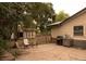 Backyard featuring a concrete patio, grill, and outdoor seating, perfect for entertaining and enjoying outdoor living at 6213 Gray St, Arvada, CO 80003