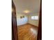 Bedroom with hardwood floors and a window for natural light at 6213 Gray St, Arvada, CO 80003