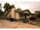 Charming single-story home with a large front yard and covered porch at 6213 Gray St, Arvada, CO 80003