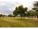 Large open space with a playground for children in the community at 6213 Gray St, Arvada, CO 80003