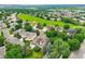 Aerial view of a neighborhood featuring well-maintained homes, green spaces, and tree-lined streets at 11070 Meade Ct, Westminster, CO 80031