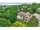 Captivating aerial perspective highlights the home's backyard with lush greenery and elevated deck at 11070 Meade Ct, Westminster, CO 80031